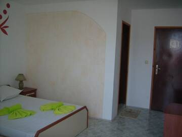 Фото номера Трехместный номер с балконом Отель Hotel Pasians г. Поморие 6