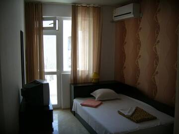 Фото номера Одноместный номер с балконом Отель Hotel Pasians г. Поморие 4