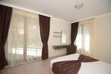 Фото номера Апартаменты с 2 спальнями Апарт-отели Boutique Rose Gardens apartments г. Поморие 2