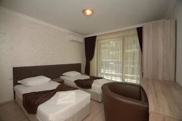 Фото номера Апартаменты с 2 спальнями Апарт-отели Boutique Rose Gardens apartments г. Поморие 4