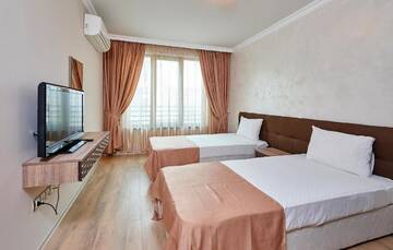 Фото номера Апартаменты с 2 спальнями Апарт-отели Boutique Rose Gardens apartments г. Поморие 8