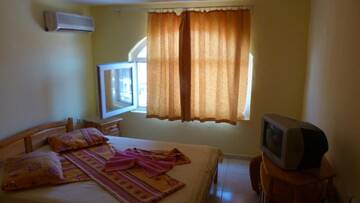 Фото номера Люкс с 2 спальнями и балконом Гостевой дом Fener Guest House г. Поморие 16