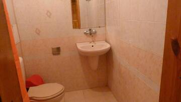 Фото номера Трехместный номер с балконом Гостевой дом Fener Guest House г. Поморие 24