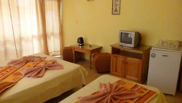 Фото номера Трехместный номер с балконом Гостевой дом Fener Guest House г. Поморие 18