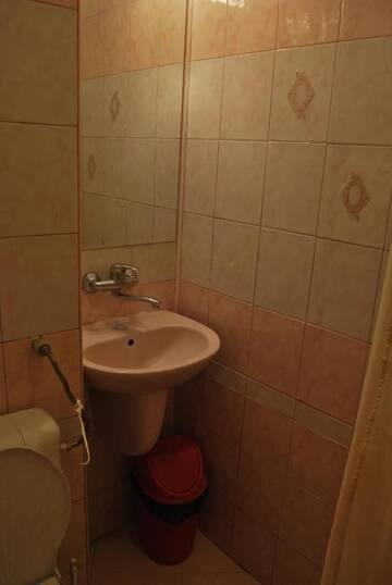 Фото номера Трехместный номер с балконом Гостевой дом Fener Guest House г. Поморие 27